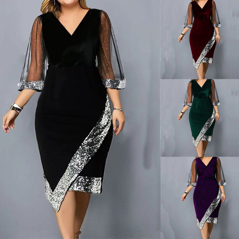 Kleid mit transparenten Mesh-Ärmeln und asymmetrisch platzierten Pailletten