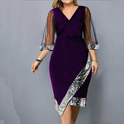 Kleid mit transparenten Mesh-Ärmeln und asymmetrisch platzierten Pailletten