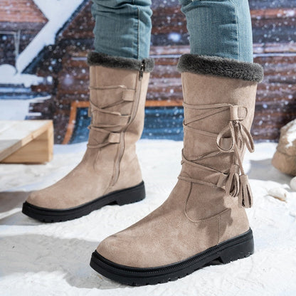 Damen Stiefel aus Kunstwildleder in Wadenhöhe mit Quasten