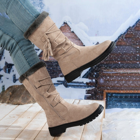 Damen Stiefel aus Kunstwildleder in Wadenhöhe mit Quasten