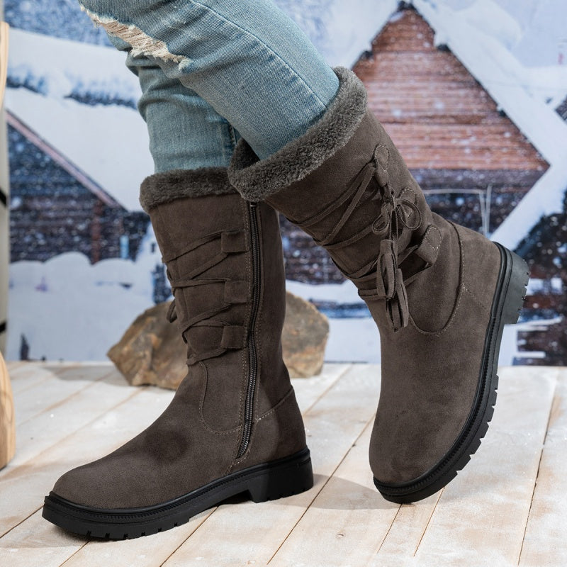Damen Stiefel aus Kunstwildleder in Wadenhöhe mit Quasten