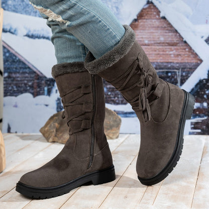 Damen Stiefel aus Kunstwildleder in Wadenhöhe mit Quasten