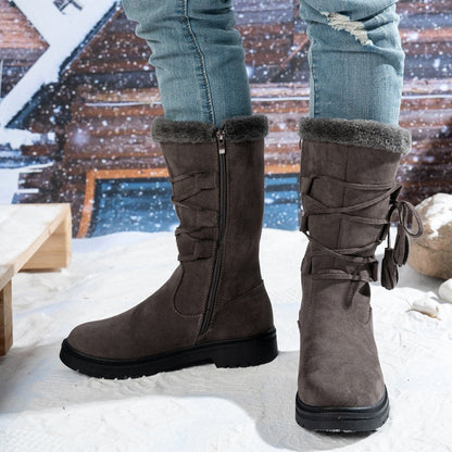 Damen Stiefel aus Kunstwildleder in Wadenhöhe mit Quasten