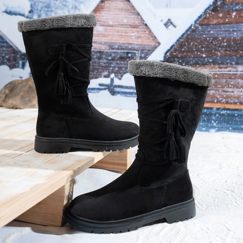 Damen Stiefel aus Kunstwildleder in Wadenhöhe mit Quasten