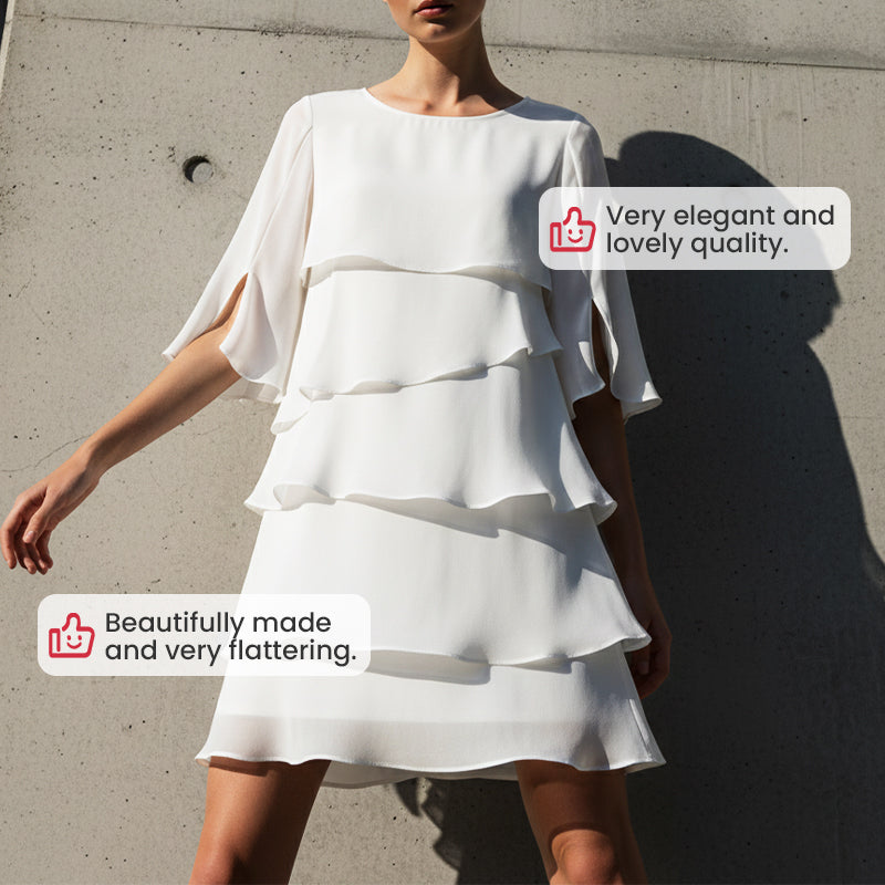 Elegantes Damenkleid mit Rüschenärmeln und mehreren Lagen