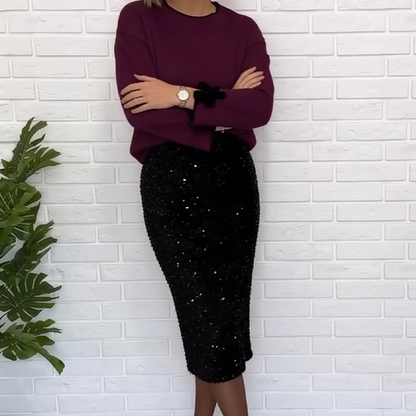 Elegantes Set aus Oberteil mit Schleifenmanschetten und Paillettenrock