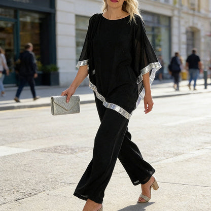 Set aus elegantem Poncho-Oberteil mit Paillettenbesatz und weit geschnittener Hose