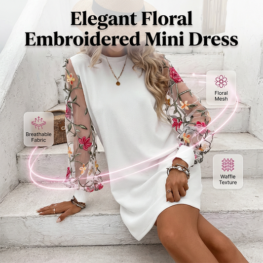 Damenkleid mit floralen Stickereien und Mesh-Ärmeln