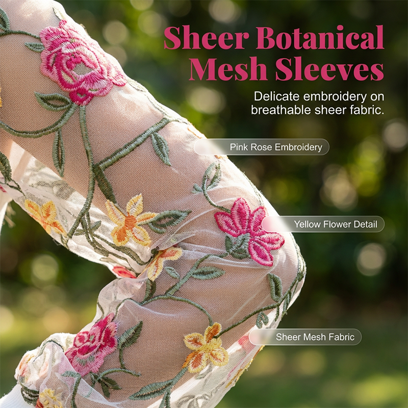 Damenkleid mit floralen Stickereien und Mesh-Ärmeln