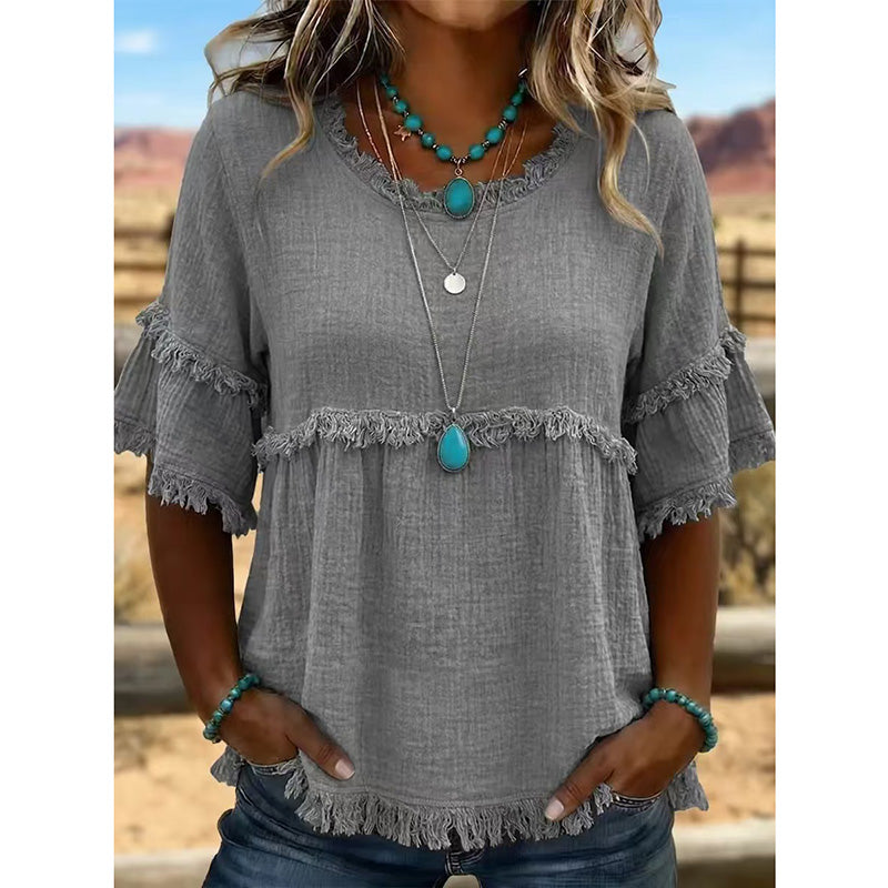 Lässiges Damenoberteil mit Fransenbesatz und Rüschenärmeln